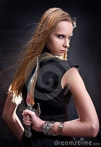 blond-young-girl-holding-dagger-8008767